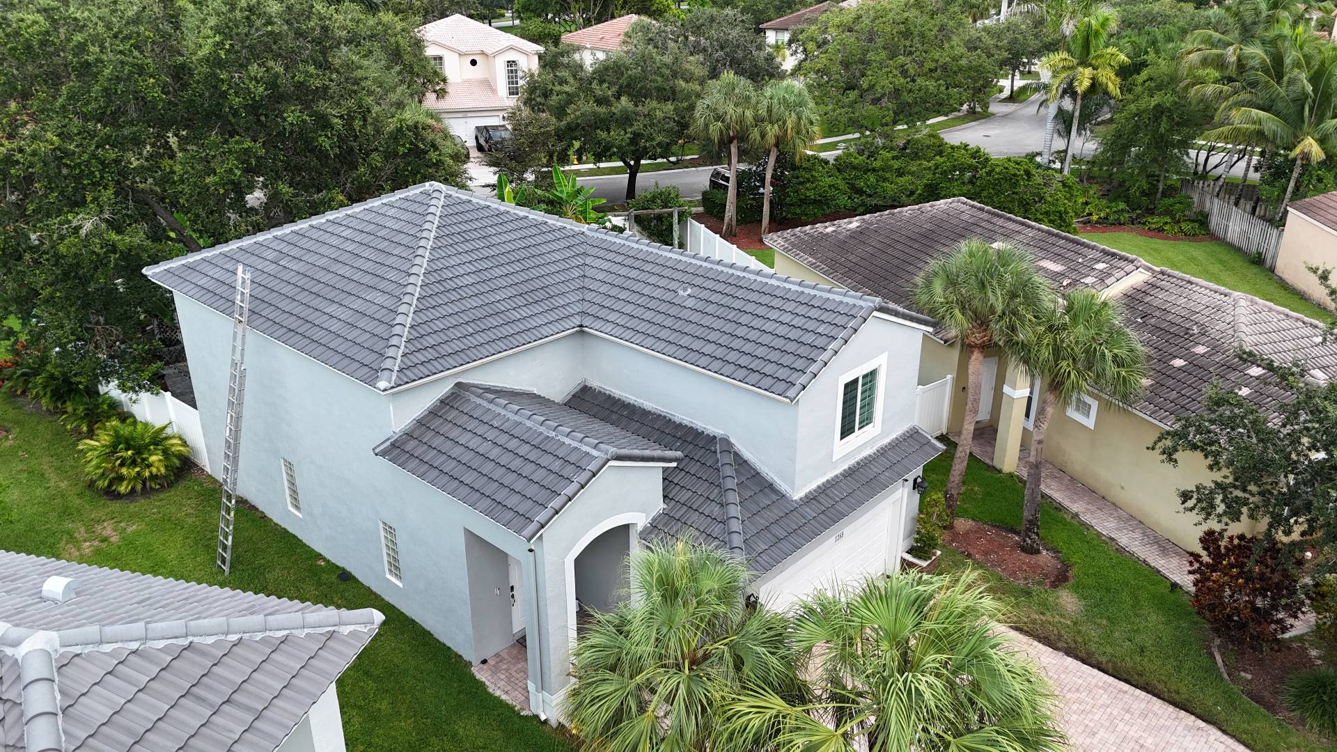 Drone inspection photograph of a completed concrete tile roof by Safetech Roofing and Windows in Broward County, Florida