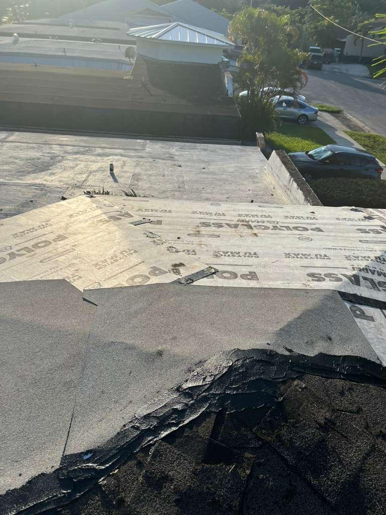 Completed self-adhered underlayment across a repaired slope before new shingles are installed, Broward County, Florida