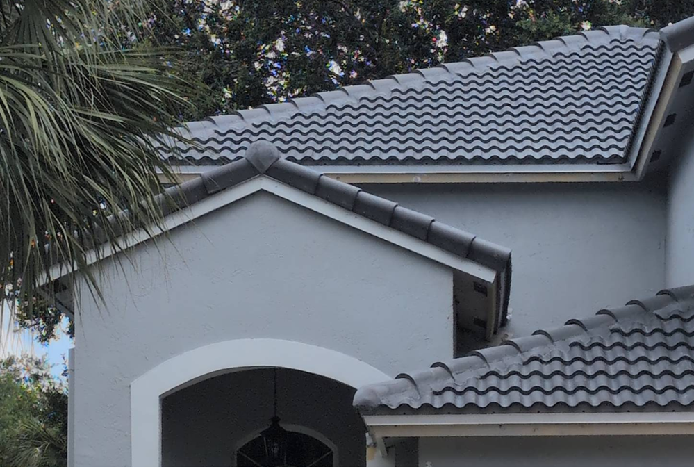 Aerial view of a South Florida home with a tile roof