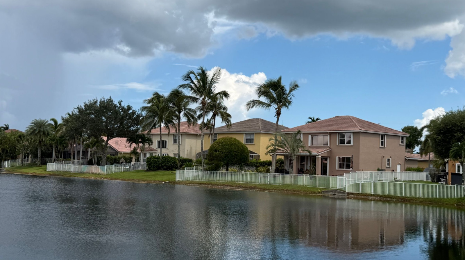 Lakefront tile-roof homes in the Encantada community, Pembroke Pines FL
