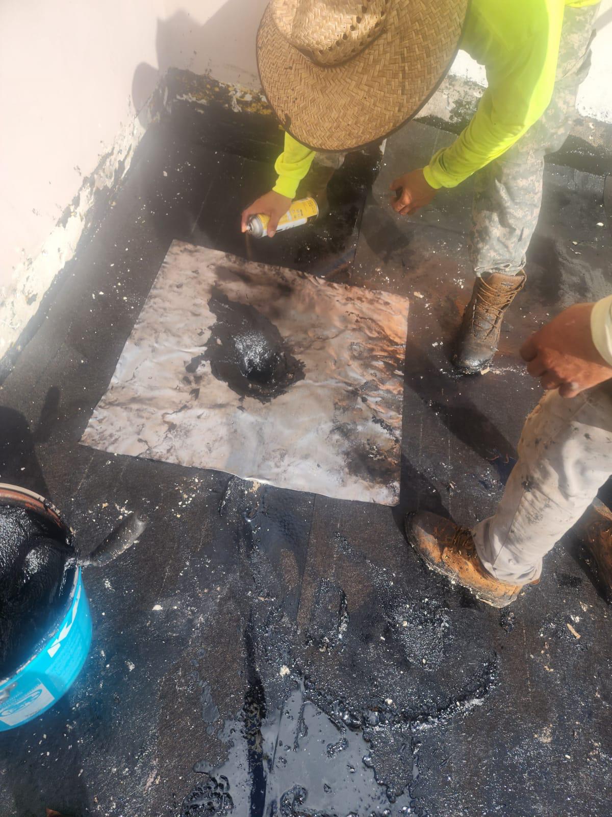 Roof drain penetration flashed into a modified bitumen commercial roof in Broward County, Florida