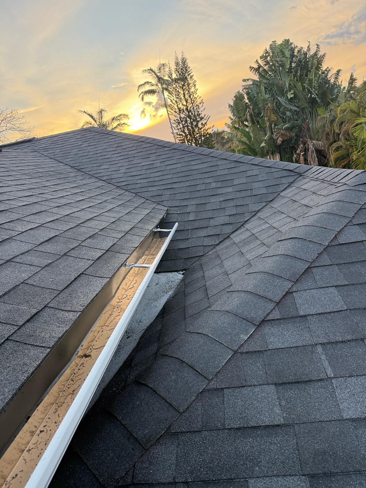 Completed charcoal architectural shingle hip roof in Broward County, Florida