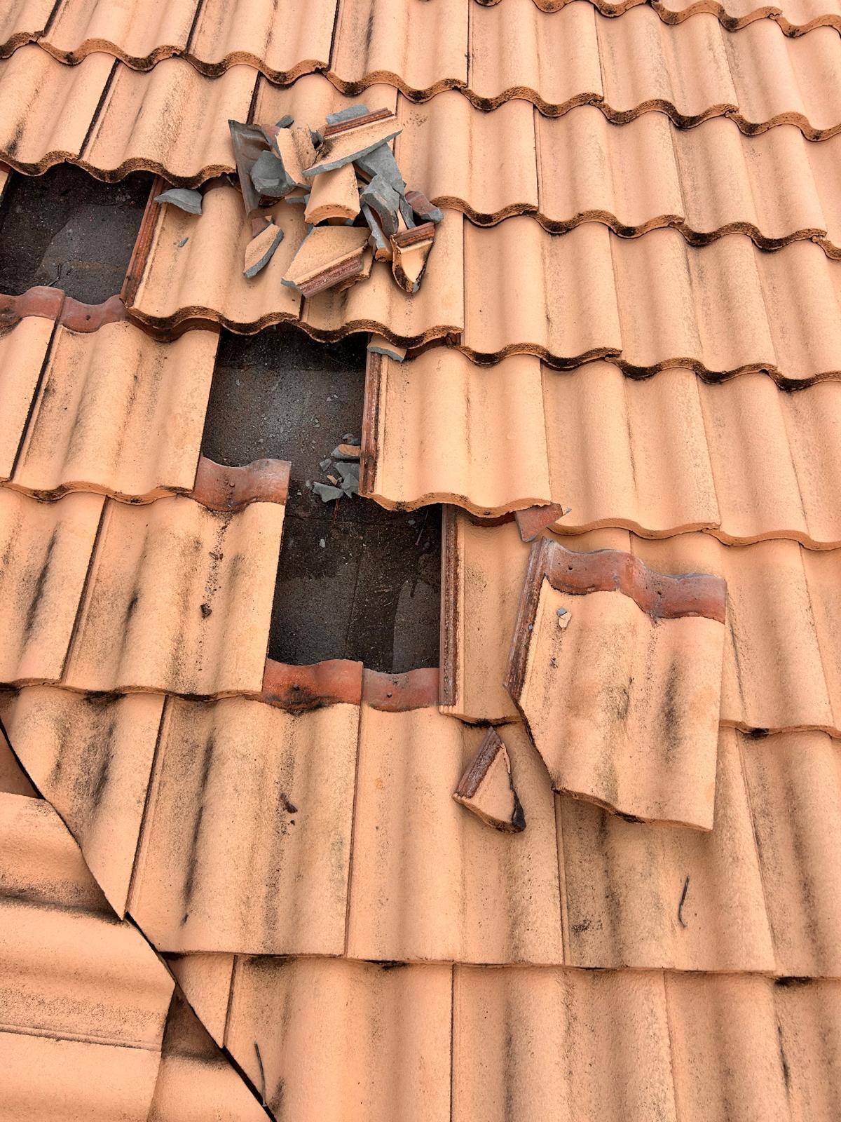 Open tile pockets exposing underlayment on a Broward County, Florida tile roof