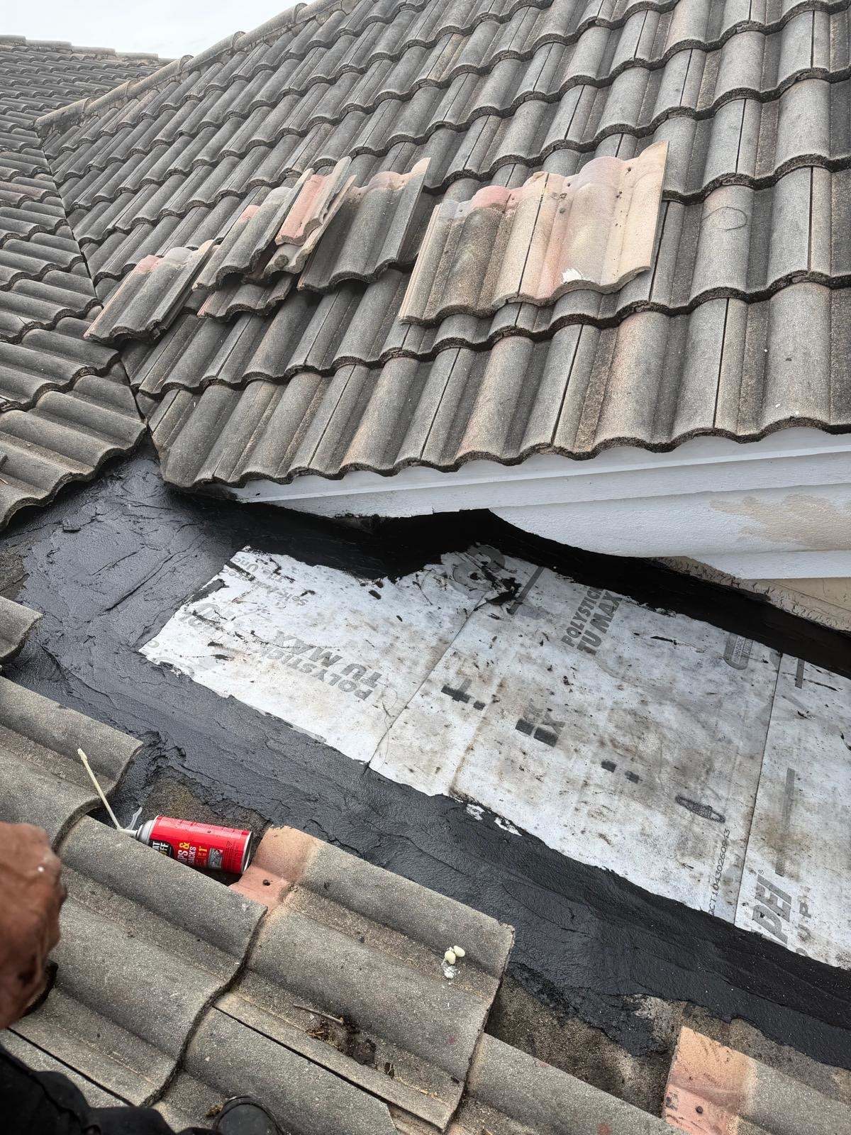 Polyglass Polystick TU MAX peel and stick underlayment patch bedded in mastic on a Broward County, Florida tile roof
