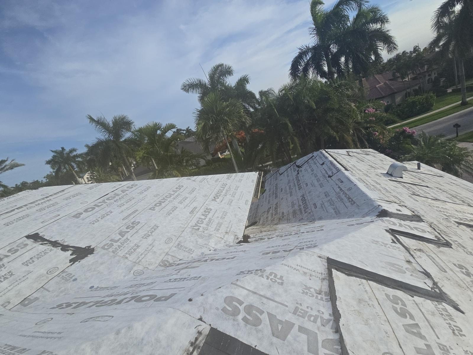 New 19/32in CDX plywood decking installed and code-nailed on a Broward County shingle roof