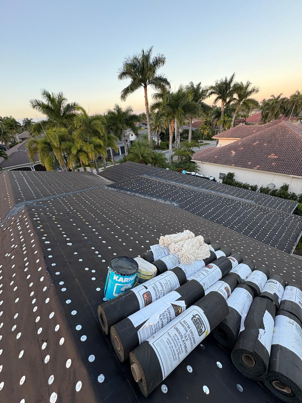 Owens Corning WeatherLock underlayment sealed along the hip and ridge line of a Broward County shingle roof
