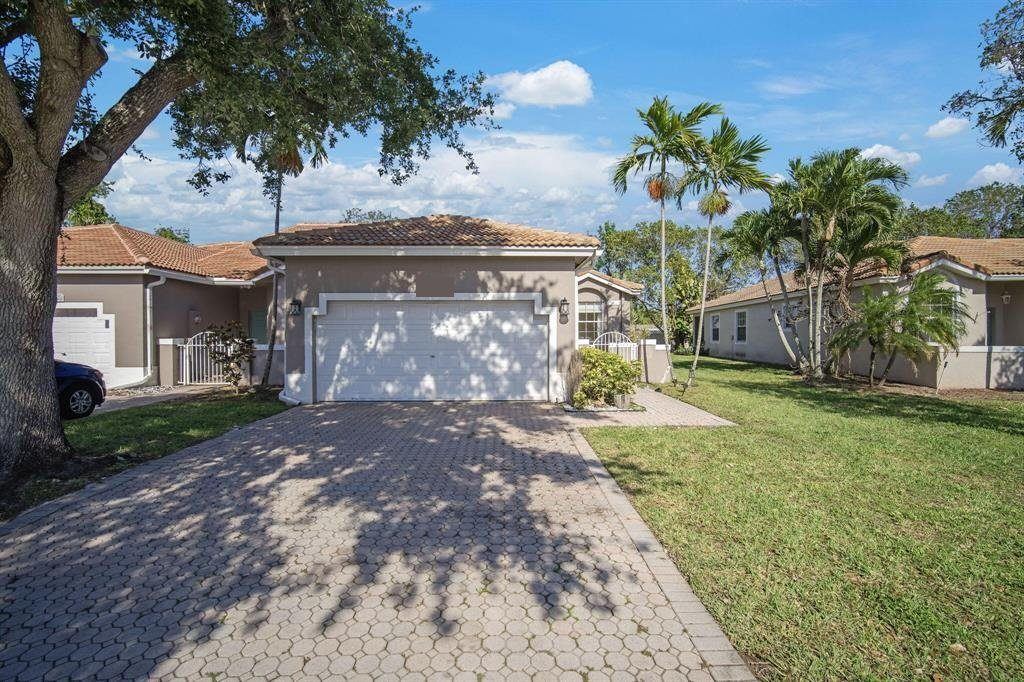 Single-family home with a concrete tile roof in Sunrise, Florida