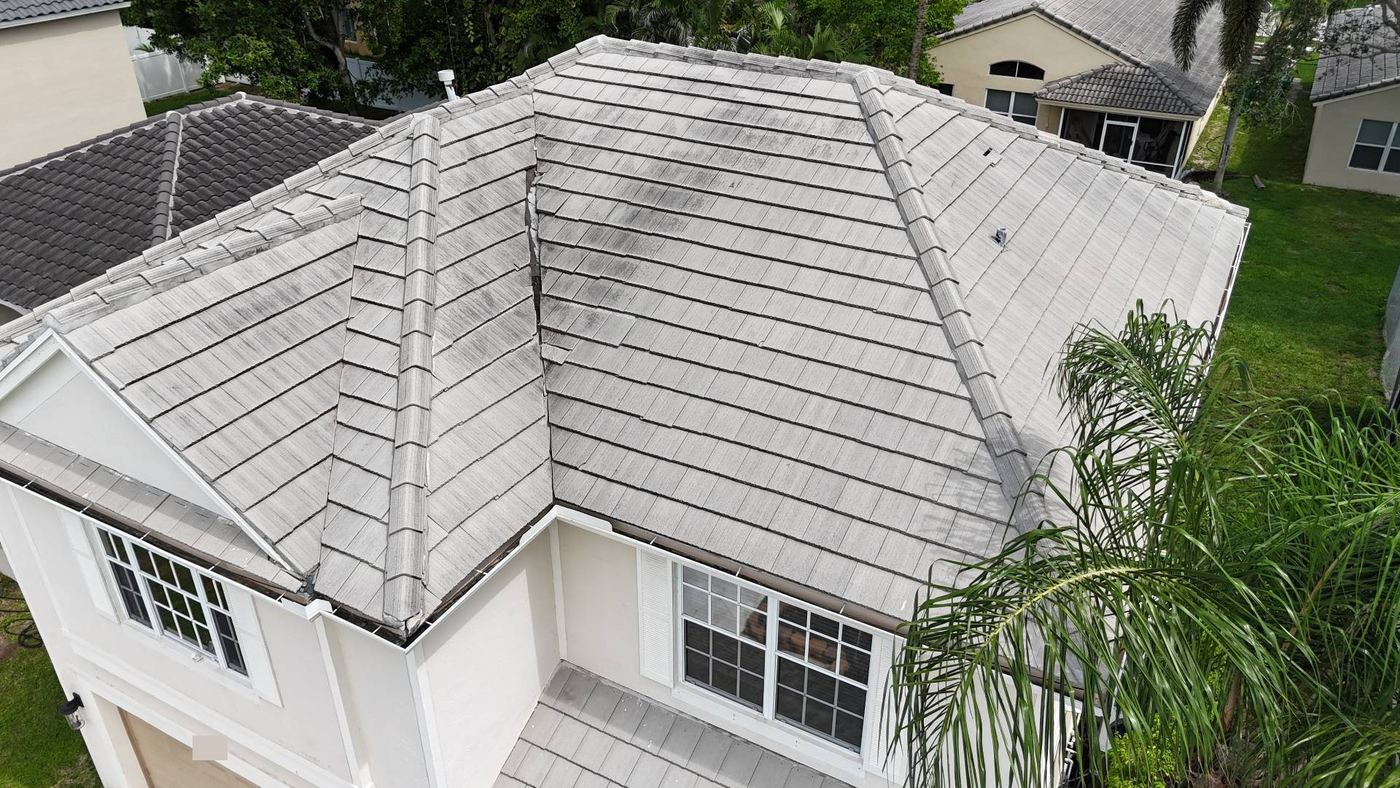 Open gap along a roof valley on a flat concrete tile roof in Tamarac, Florida